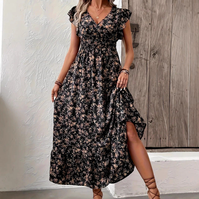 Damern Maxi-klänning med blommigt mönster och voluminösa ärmar Mirla-Eva Jonsson