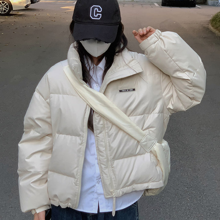 Damern Mode samt isolerad pufferjacka med hög krage och sidofickor med dragkedja Mirla-Eva Jonsson