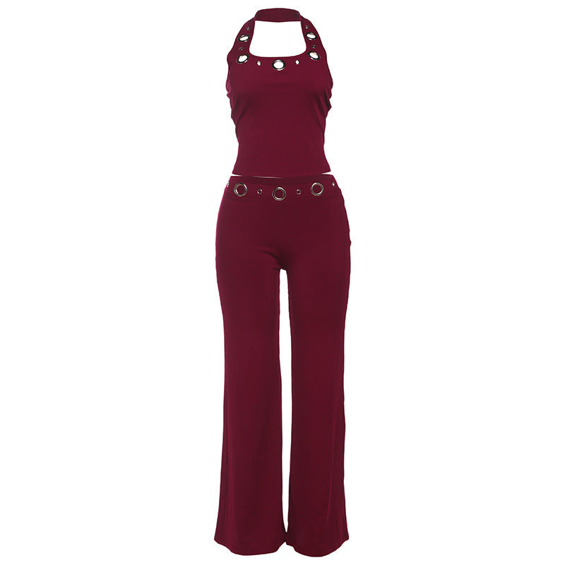 Damern Moderiktig Jumpsuit med dekorativt halterneck och bältesdetaljer Mirla-Eva Jonsson