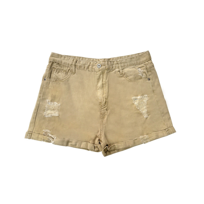 Damern Modiska Destroyed Shorts i Denim med avslappnad passform och fransiga detaljer Mirla-Eva Jonsson