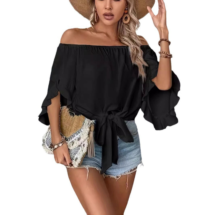 Damern Off-Shoulder Blus med Rufsdetaljer och Midjeband Mirla-Eva Jonsson