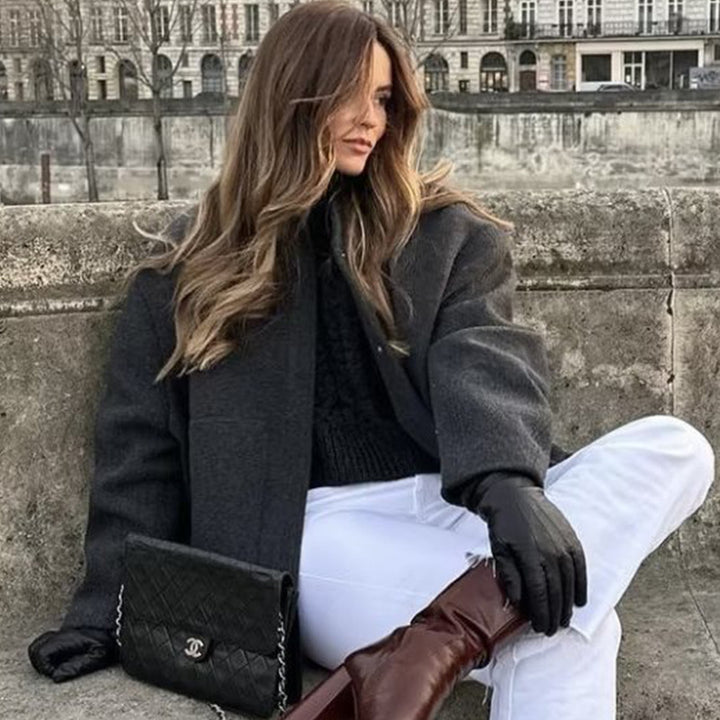 Damern Oversized Stickad jacka i mjukt teddytyg med ståkrage och sidofickor Mirla-Eva Jonsson