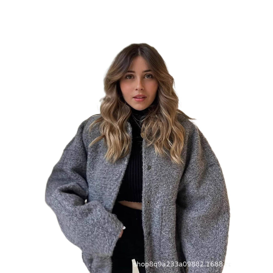 Damern Oversized Stickad jacka i mjukt teddytyg med ståkrage och sidofickor Mirla-Eva Jonsson