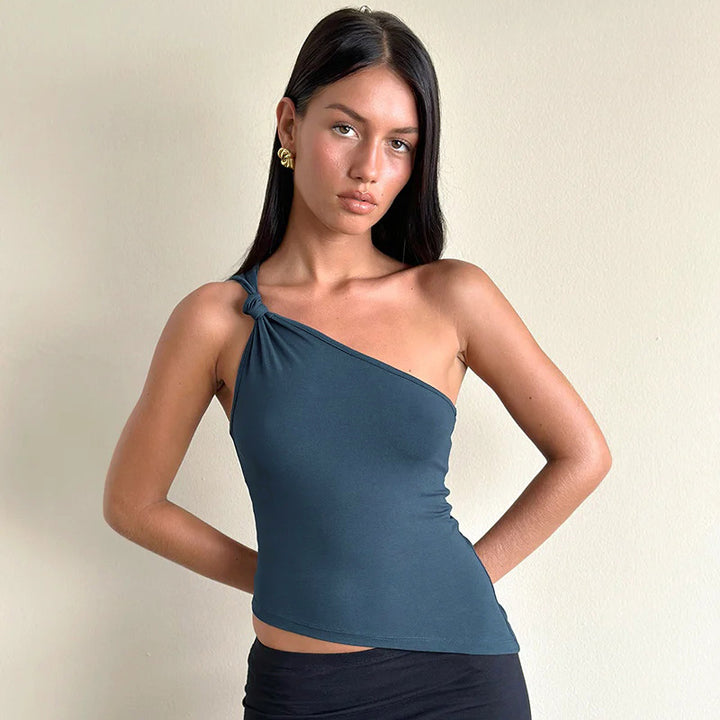 Damern asymmetrisk axeltröja med elegant knutdetalj Mirla-Eva Jonsson