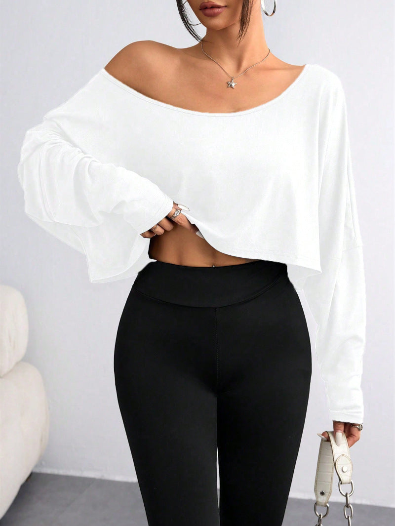 Damern avslappnad crop-top med vid passform och asymmetrisk halsringning Mirla-Eva Jonsson