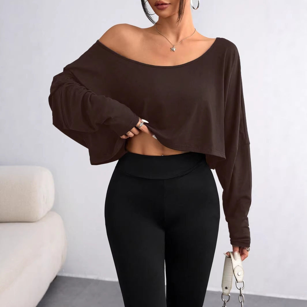 Damern avslappnad crop-top med vid passform och asymmetrisk halsringning Mirla-Eva Jonsson