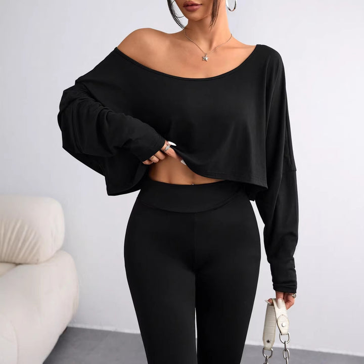 Damern avslappnad crop-top med vid passform och asymmetrisk halsringning Mirla-Eva Jonsson