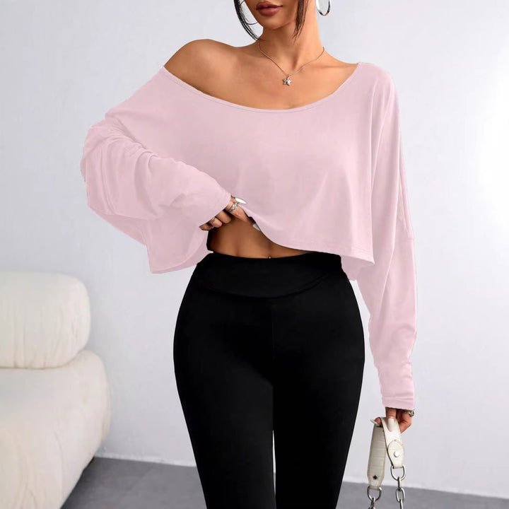 Damern avslappnad crop-top med vid passform och asymmetrisk halsringning Mirla-Eva Jonsson