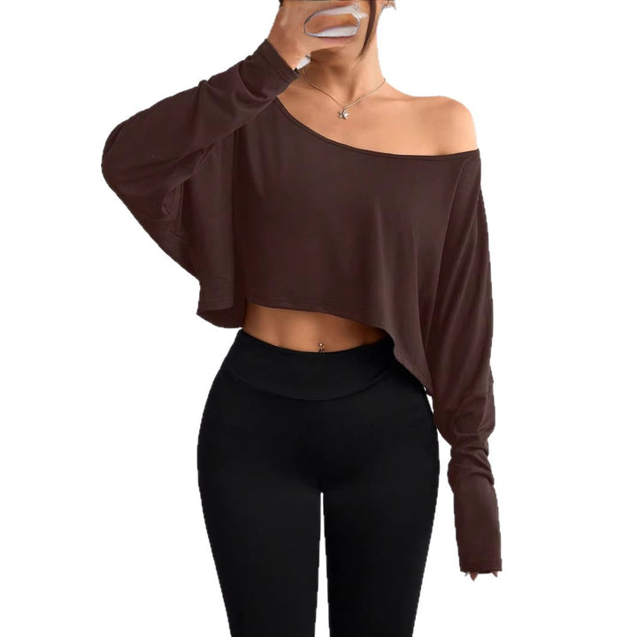 Damern avslappnad crop-top med vid passform och asymmetrisk halsringning Mirla-Eva Jonsson
