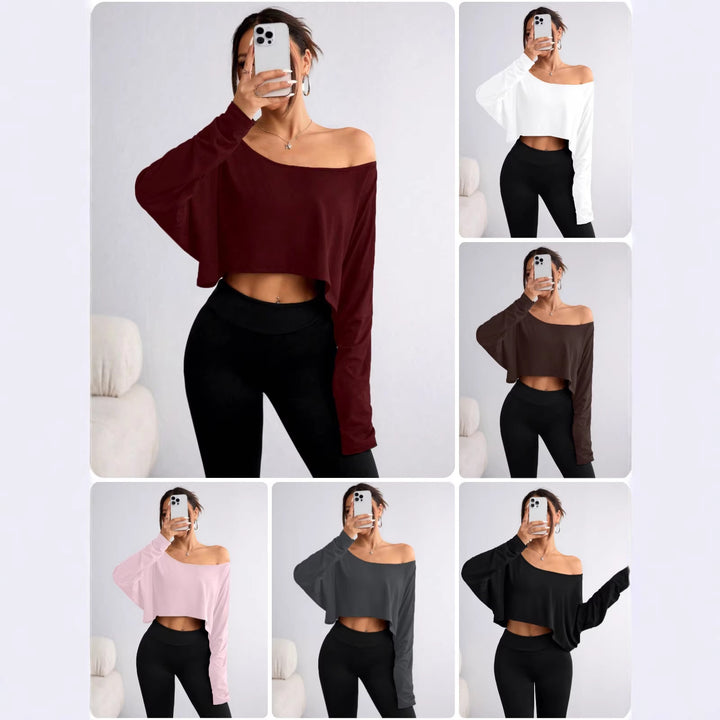 Damern avslappnad crop-top med vid passform och asymmetrisk halsringning Mirla-Eva Jonsson
