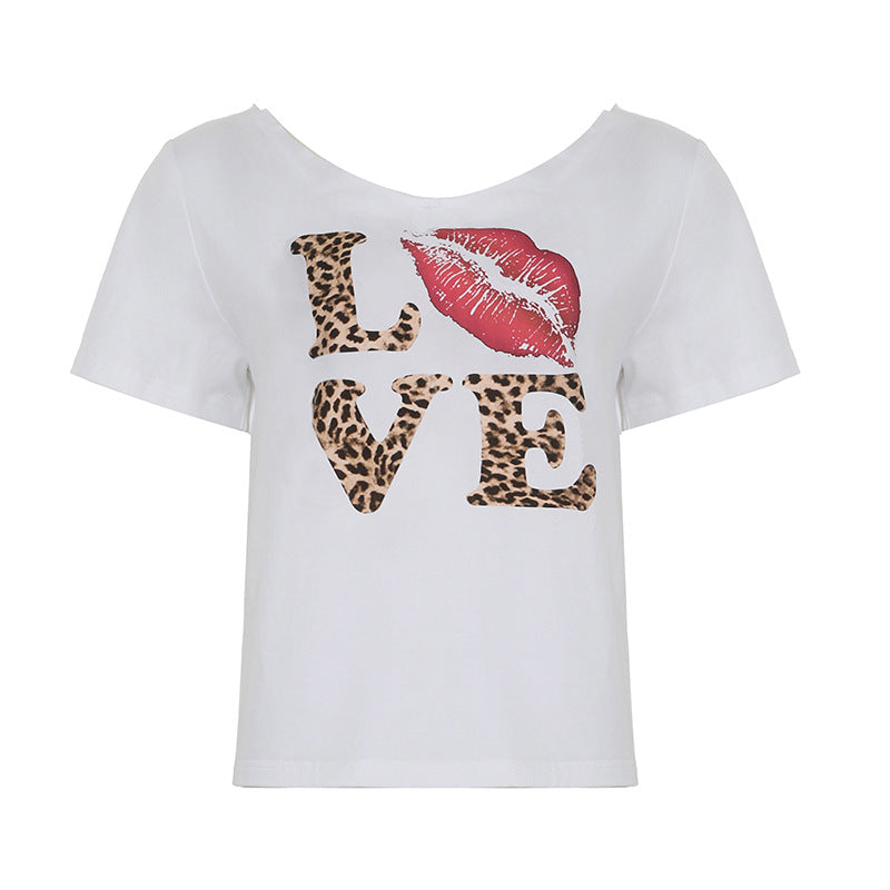 Damern avslappnad tryckt T-shirt med vid hals Mirla-Eva Jonsson