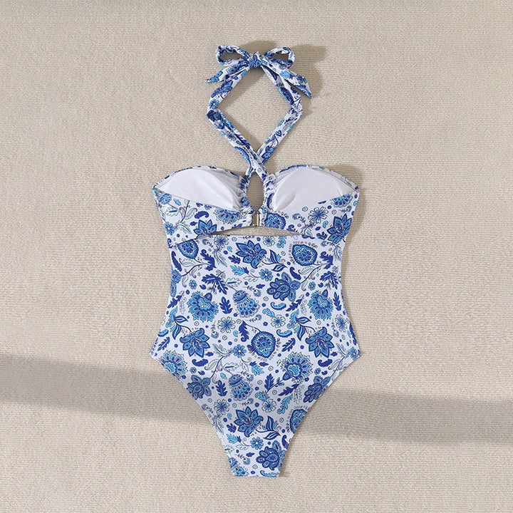 Damern baddräkt med sofistikerade cut-outs och moderiktig halterdesign Mirla-Eva Jonsson