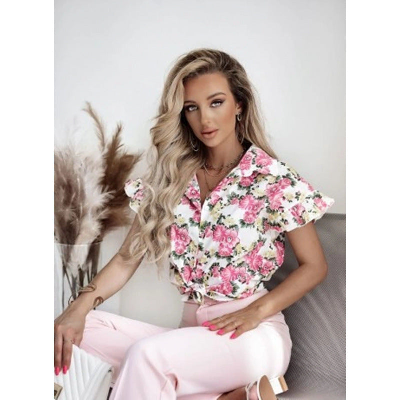 Damern blusartad skjorta med blommönster och volangdetaljer Mirla-Eva Jonsson