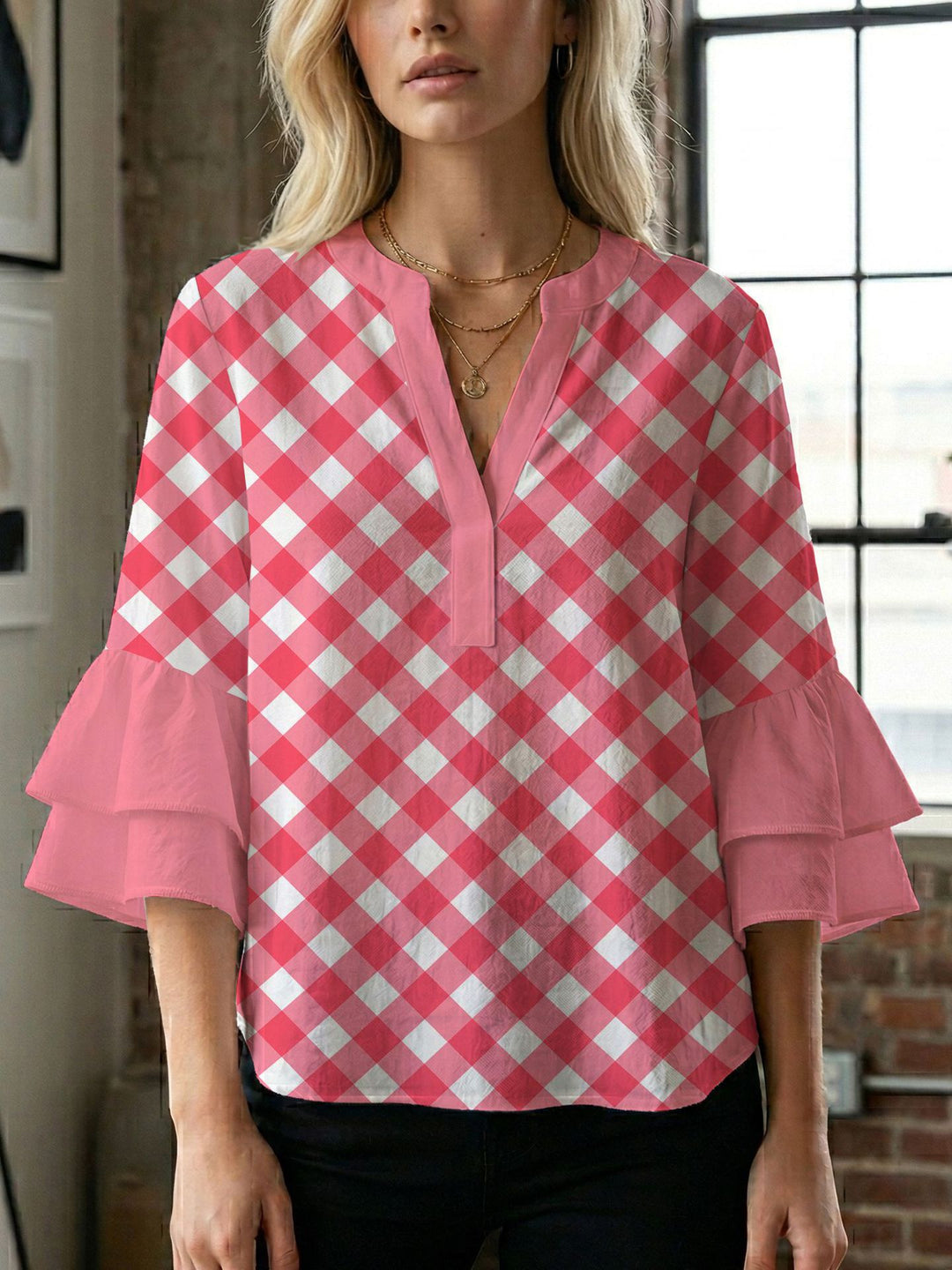 Damern blusenshirt med voluminösa ärmar och kreativt tryckdesign Mirla-Eva Jonsson