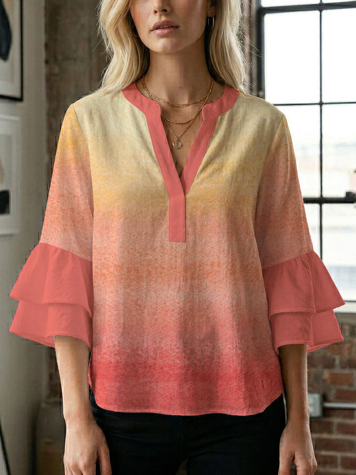 Damern blusenshirt med voluminösa ärmar och kreativt tryckdesign Mirla-Eva Jonsson