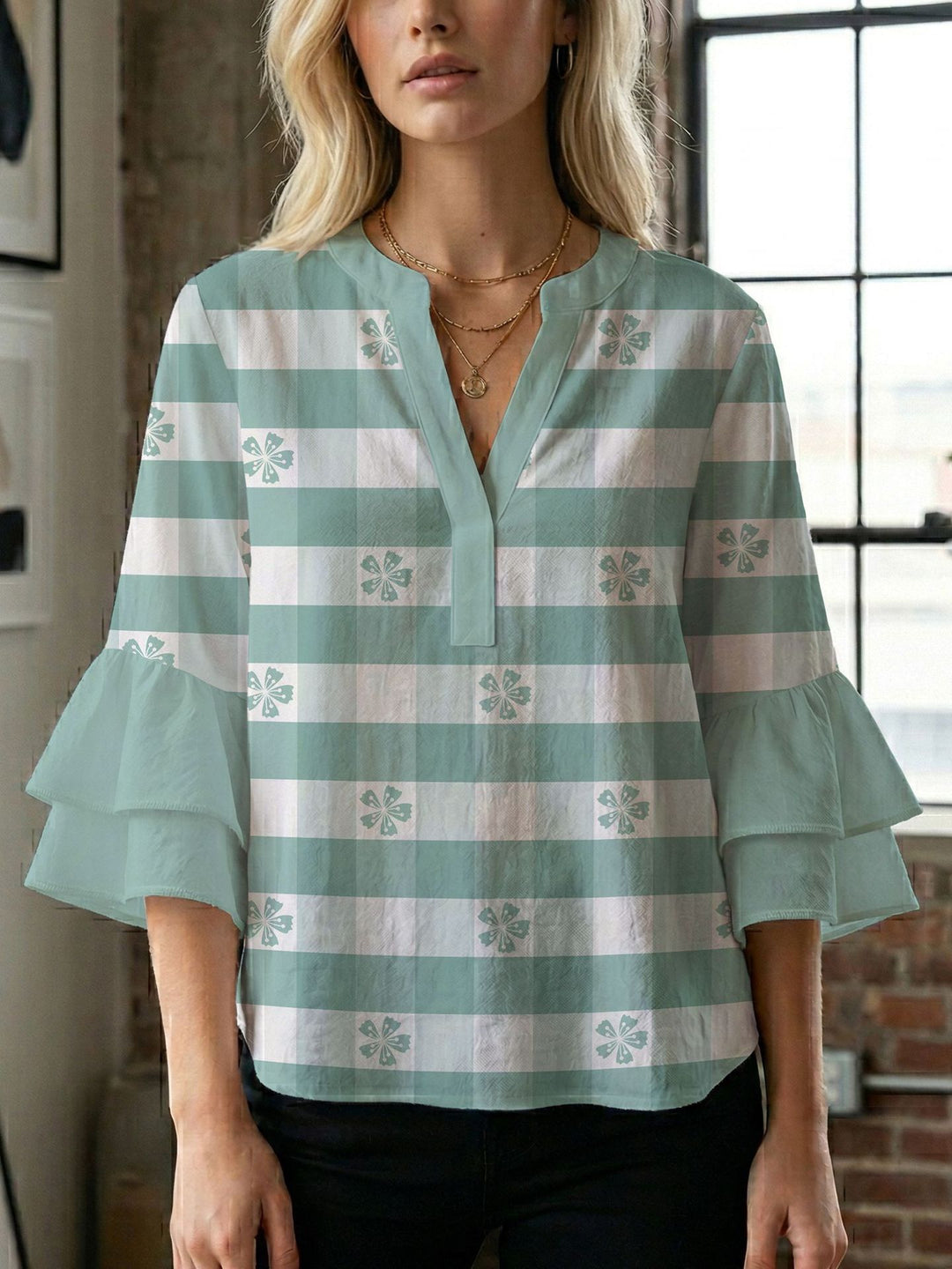 Damern blusenshirt med voluminösa ärmar och kreativt tryckdesign Mirla-Eva Jonsson