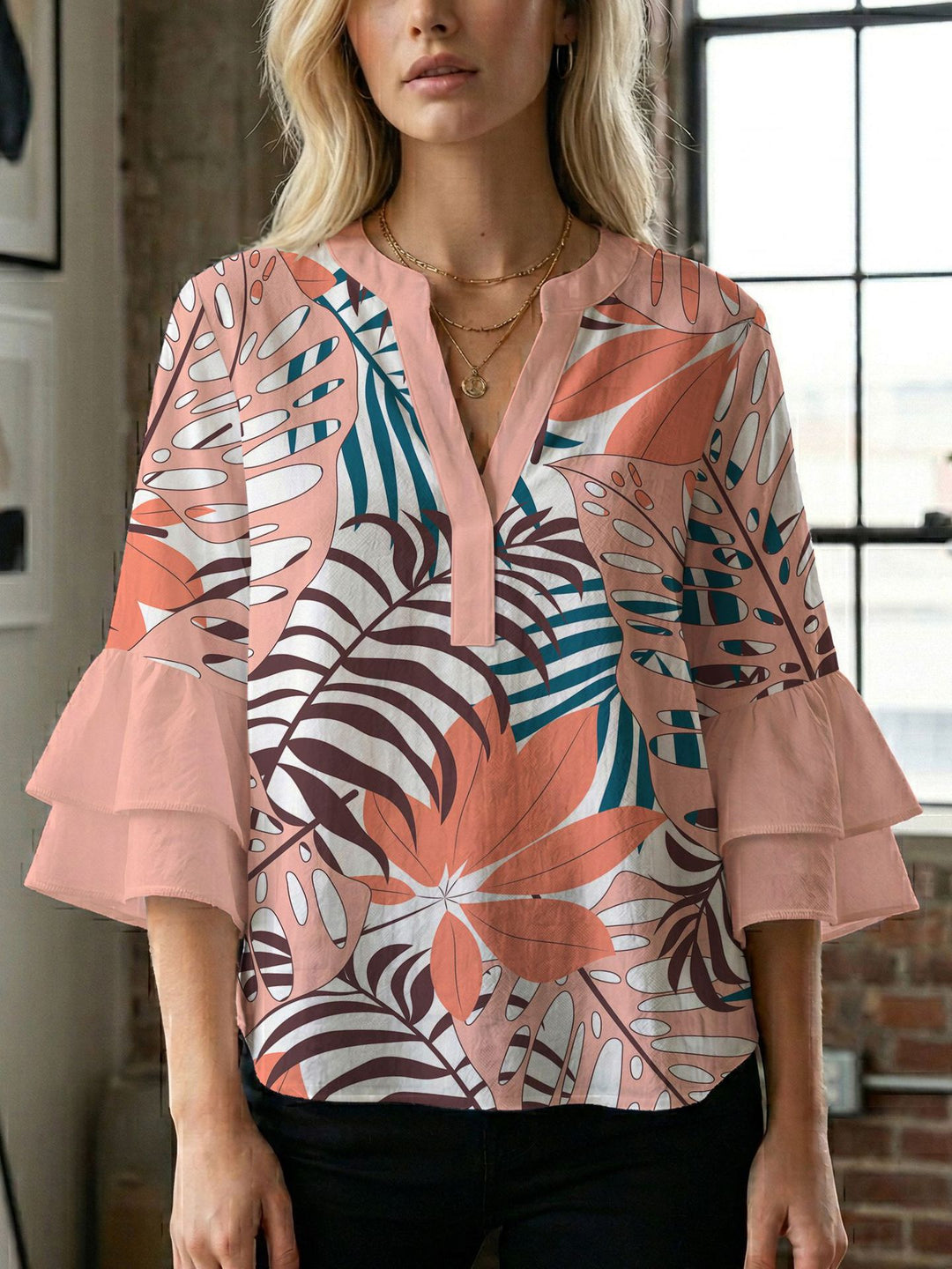 Damern blusenshirt med voluminösa ärmar och kreativt tryckdesign Mirla-Eva Jonsson