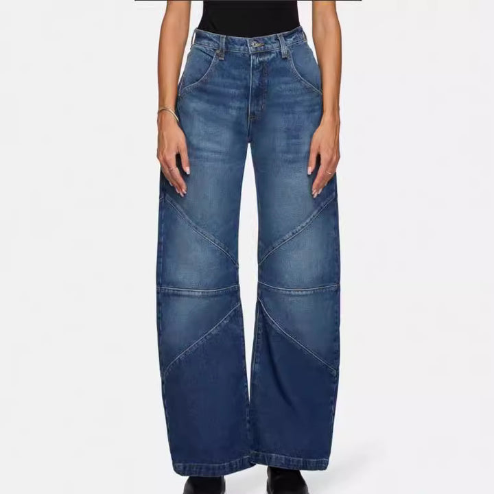 Damern breda jeans med unik sömnadsdesign i trendig stil Mirla-Eva Jonsson