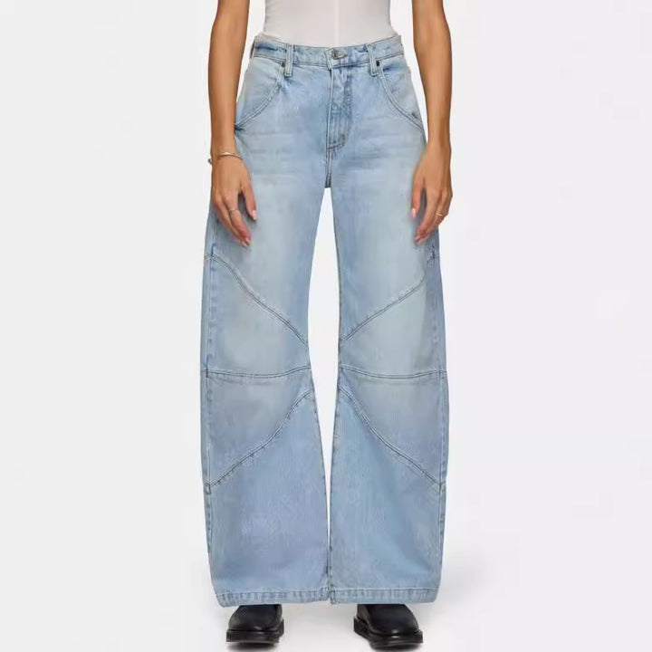 Damern breda jeans med unik sömnadsdesign i trendig stil Mirla-Eva Jonsson
