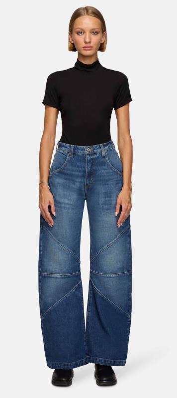 Damern breda jeans med unik sömnadsdesign i trendig stil Mirla-Eva Jonsson