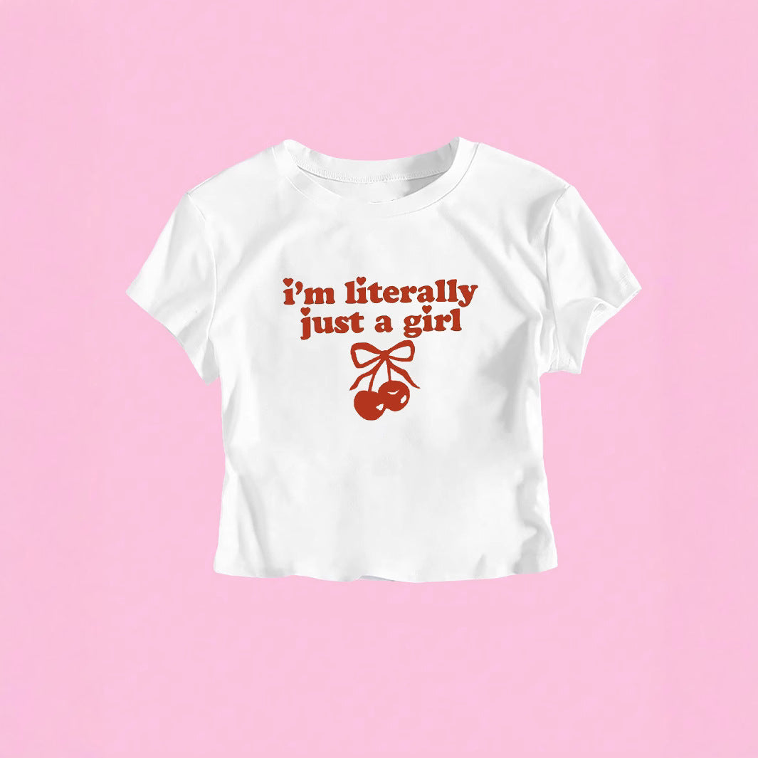 Damern crop-t-shirt med fräckt körsbärsmotiv och lekfullt konstnärligt design Mirla-Eva Jonsson