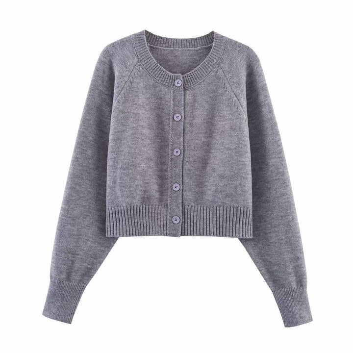 Damern cropped stickad jacka med knappdetaljer och elastisk midja Mirla-Eva Jonsson