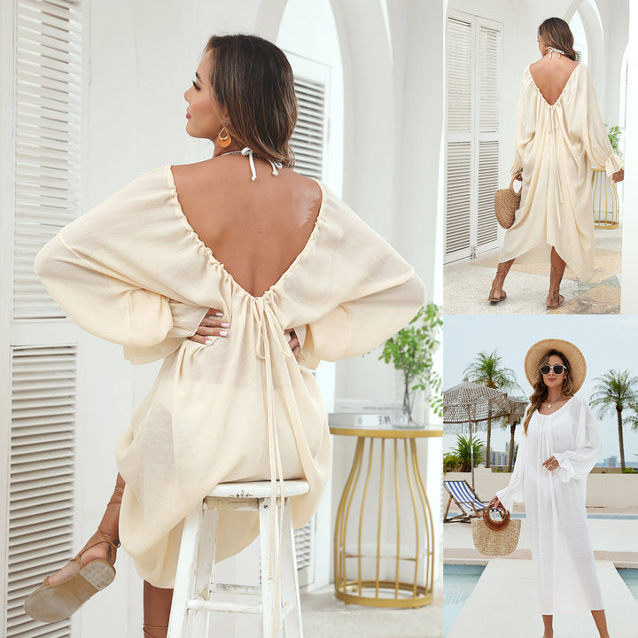 Damern elegant blus med djup ryggöppning och voluminösa ärmar Mirla-Eva Jonsson
