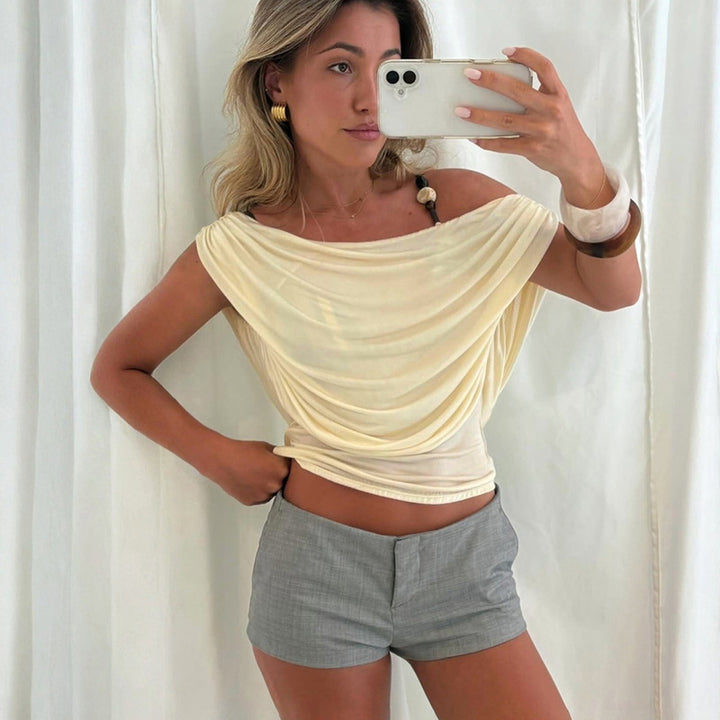 Damern elegant löst topp med drapering Mirla-Eva Jonsson