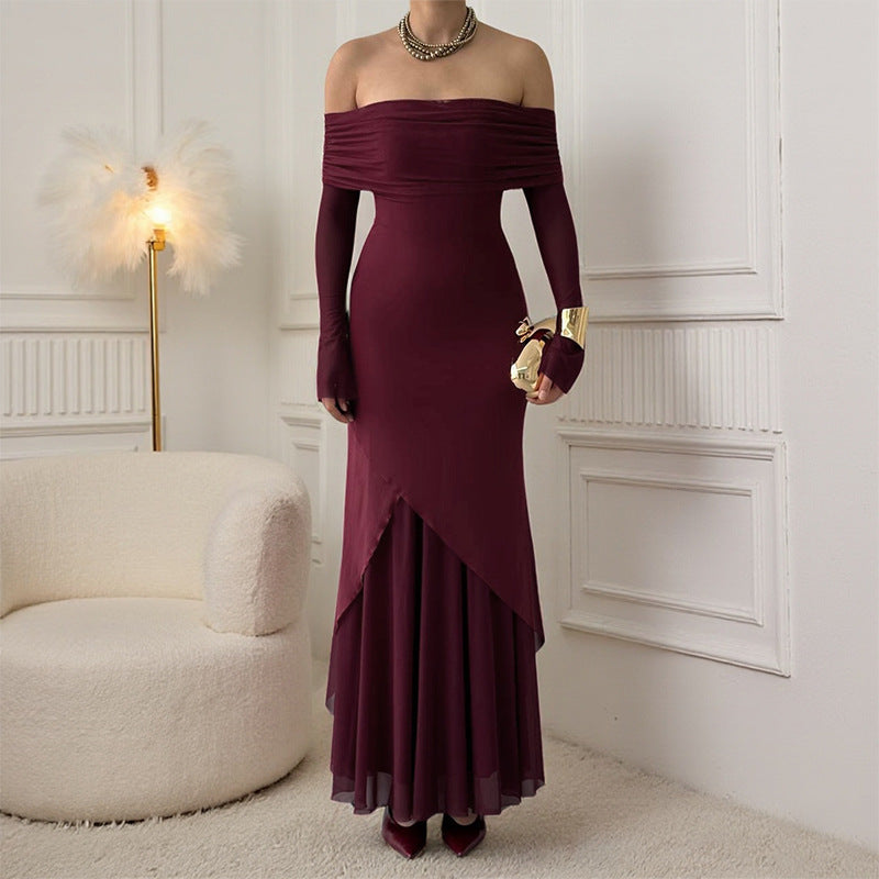 Damern elegant off-the-shoulder maxikjol med raffinerad ruffle-topp och asymmetrisk fåll Mirla-Eva Jonsson