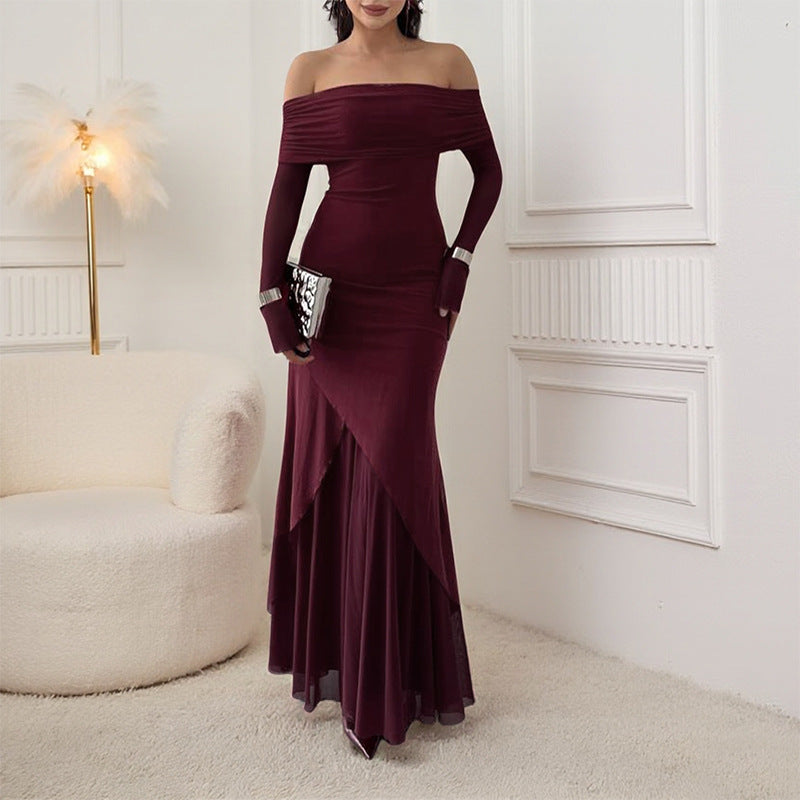Damern elegant off-the-shoulder maxikjol med raffinerad ruffle-topp och asymmetrisk fåll Mirla-Eva Jonsson