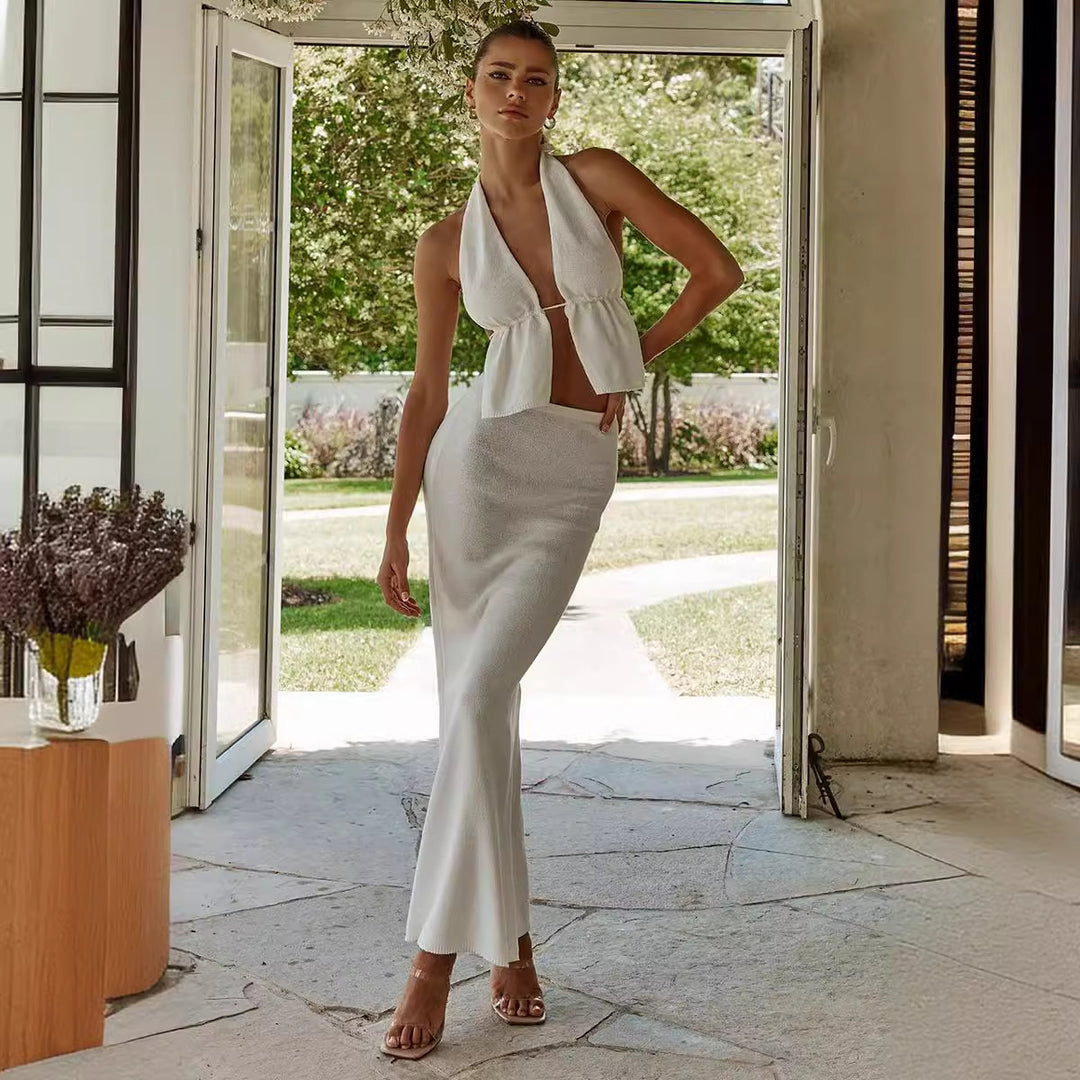 Damern elegant omslagstopp med asymmetrisk design och matchande maxikjol Mirla-Eva Jonsson