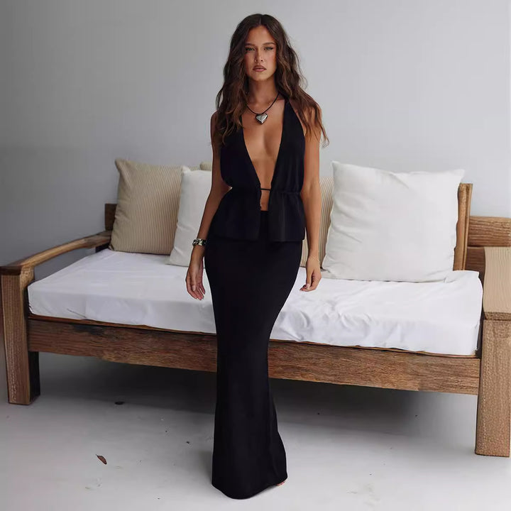 Damern elegant omslagstopp med asymmetrisk design och matchande maxikjol Mirla-Eva Jonsson