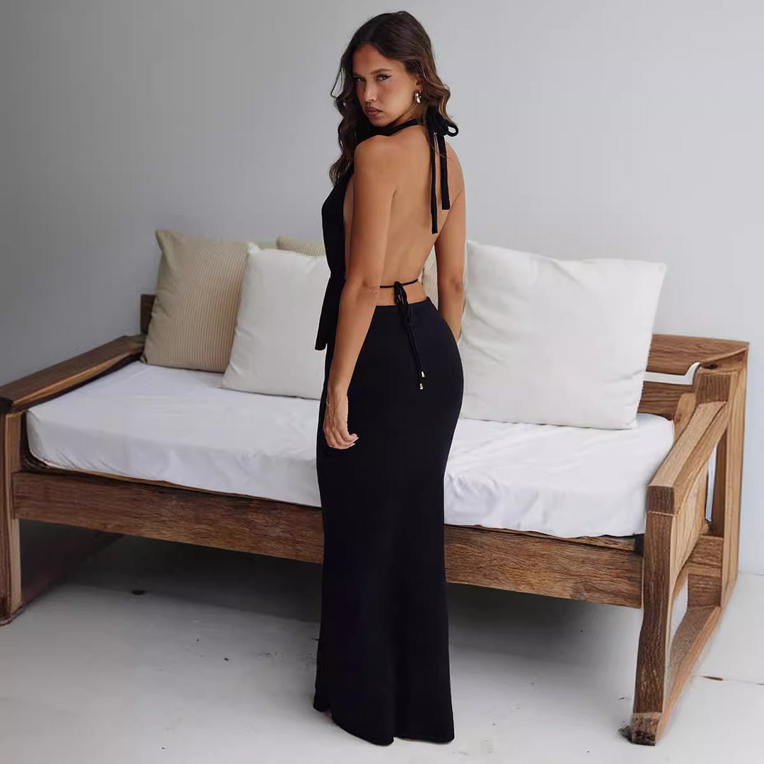 Damern elegant omslagstopp med asymmetrisk design och matchande maxikjol Mirla-Eva Jonsson