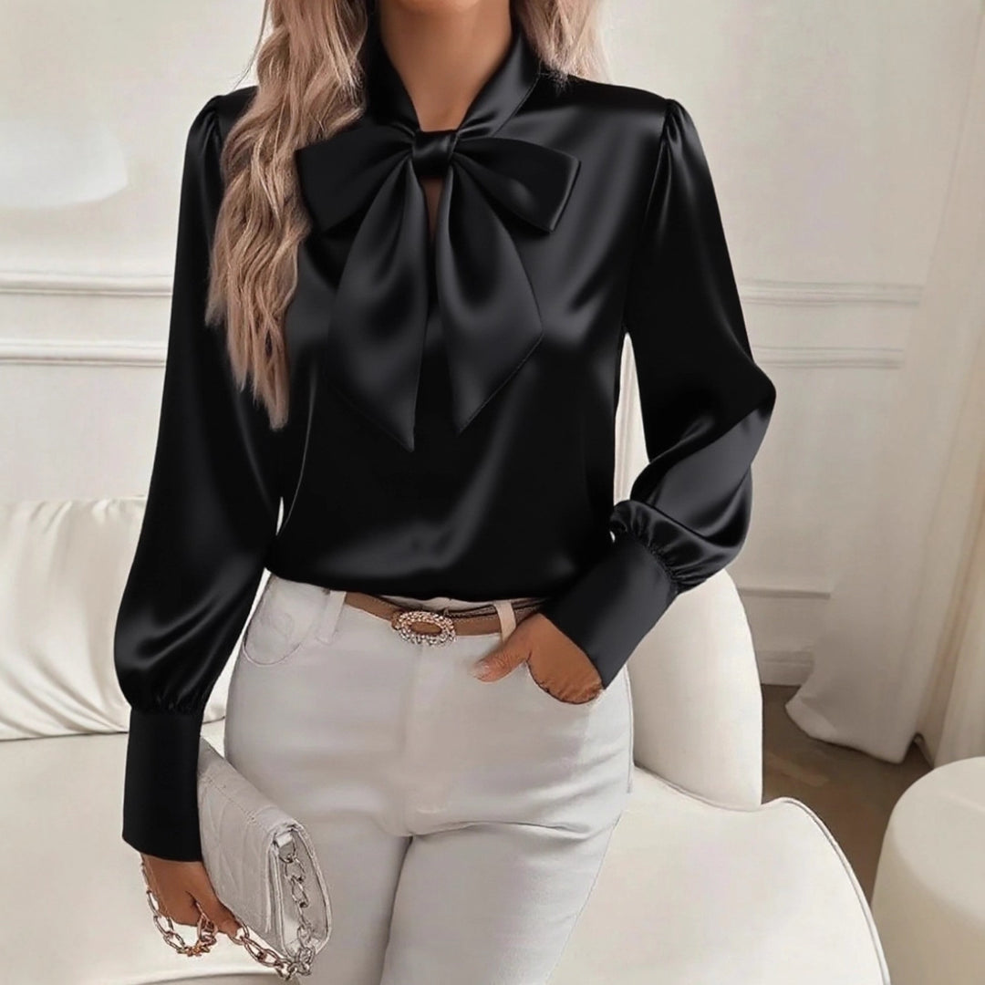 Damern elegant satinblus med slipskrage och puffärmar Mirla-Eva Jonsson