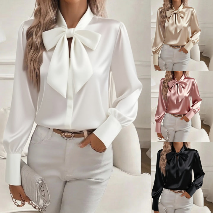 Damern elegant satinblus med slipskrage och puffärmar Mirla-Eva Jonsson