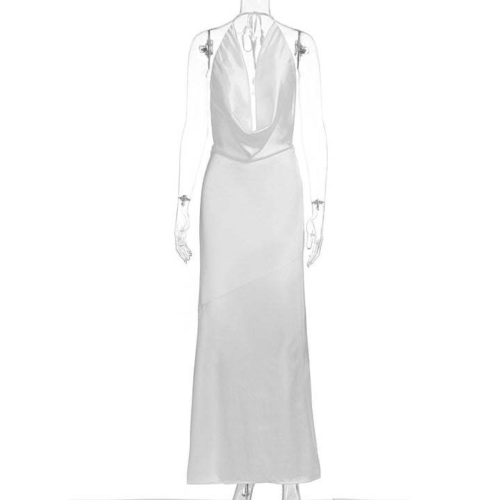 Damern eleganta chiffongmaxiklänning med djup ryggöppning och smart omslagningsdesign Mirla-Eva Jonsson