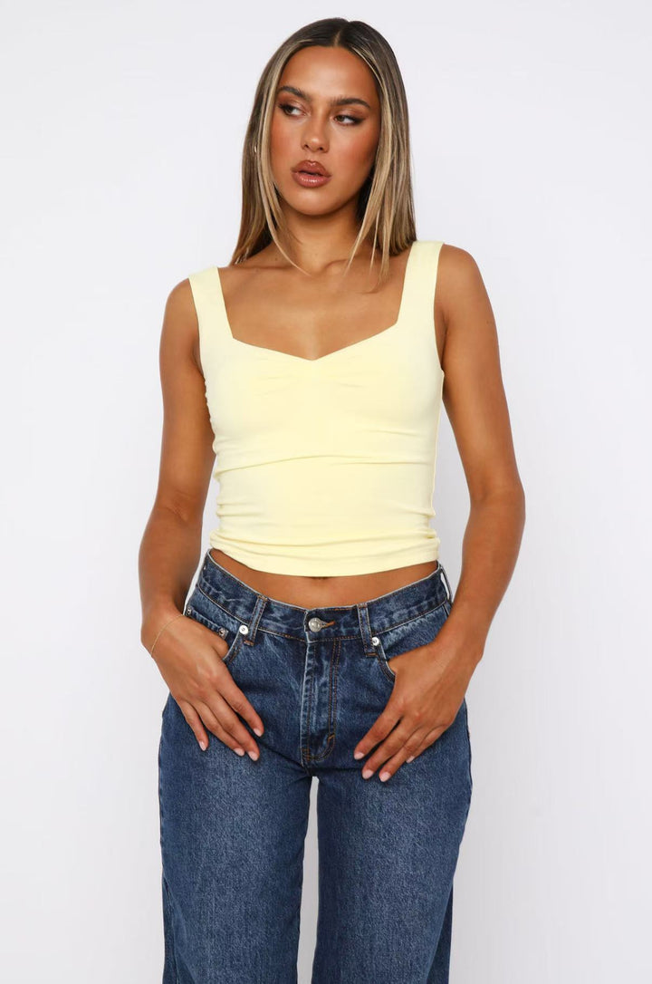 Damern figurnära Crop-Top med breda axelremmar och V-hals Mirla-Eva Jonsson