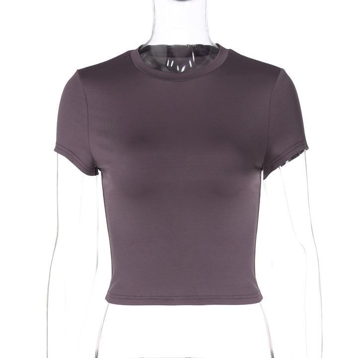 Damern figurnära T-shirt med kort ärm och dekorativ rynkelement Mirla-Eva Jonsson