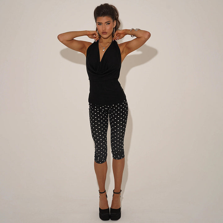 Damern figurnära jumpsuit i polka-prickdesign Mirla-Eva Jonsson
