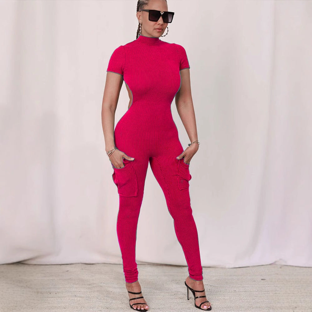 Damern figurnära jumpsuit med hög krage och sidofickor Mirla-Eva Jonsson