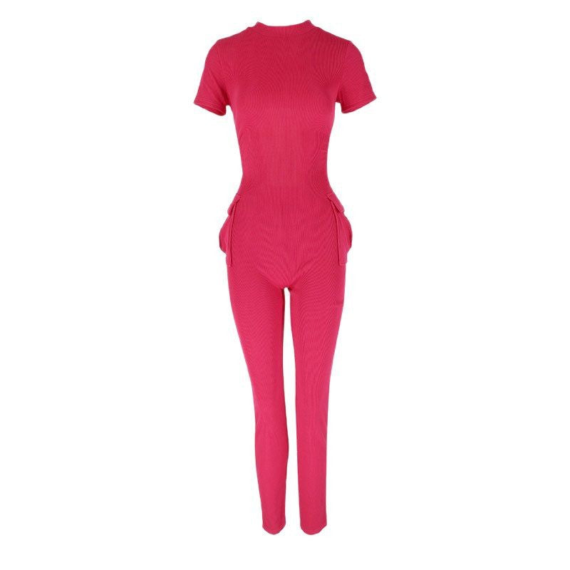 Damern figurnära jumpsuit med hög krage och sidofickor Mirla-Eva Jonsson