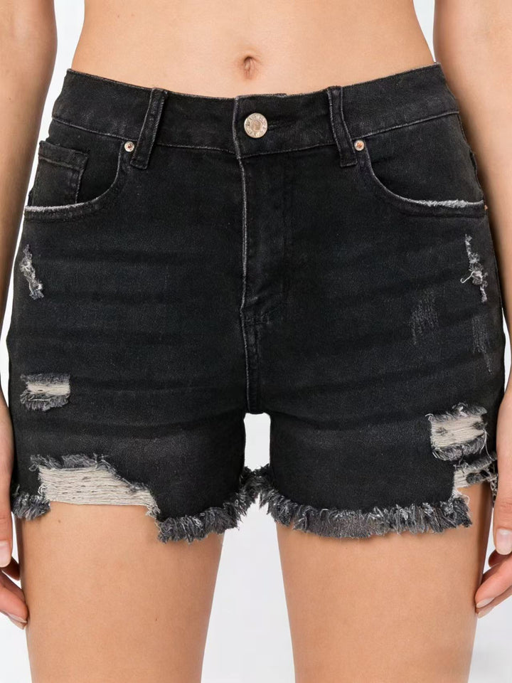 Damern förstörda denimshorts med fransig fåll och stiliga rivdetaljer Mirla-Eva Jonsson