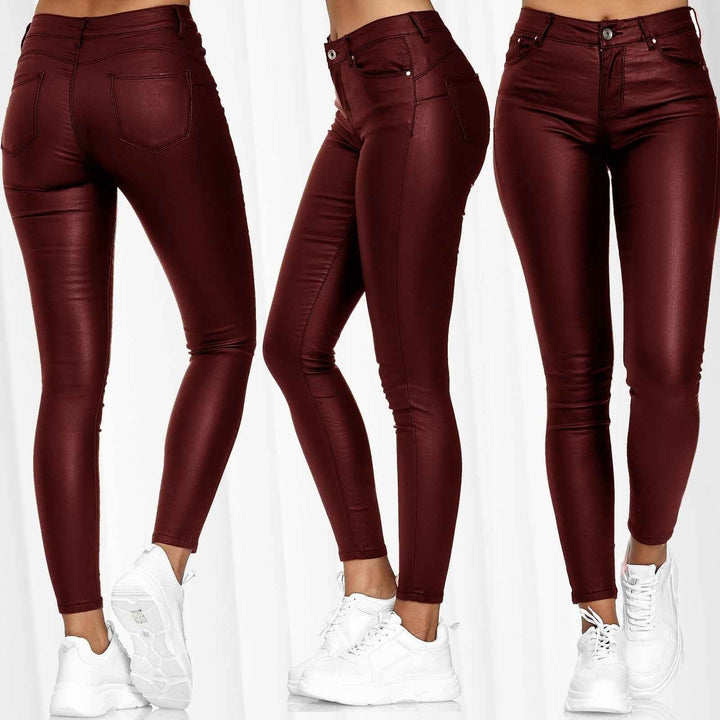 Damern glatta läderleggings med hög midja och figursydd design Mirla-Eva Jonsson