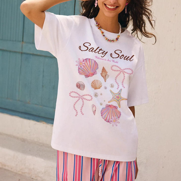Damern grafik T-shirt med maritimt musselmönster och avslappnad passform Mirla-Eva Jonsson