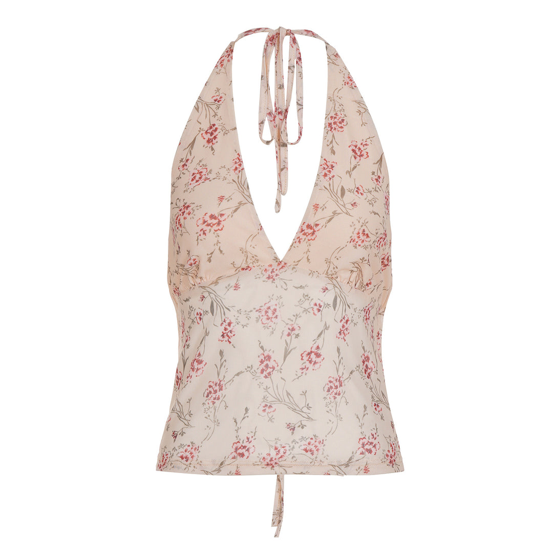 Damern halterneck-top med blommönster och volangdetaljer Mirla-Eva Jonsson