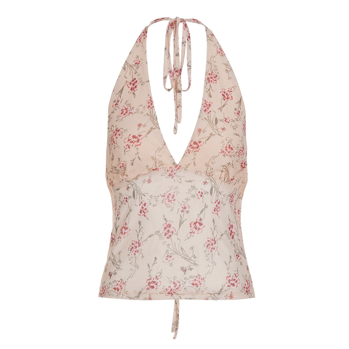 Damern halterneck-top med blommönster och volangdetaljer Mirla-Eva Jonsson