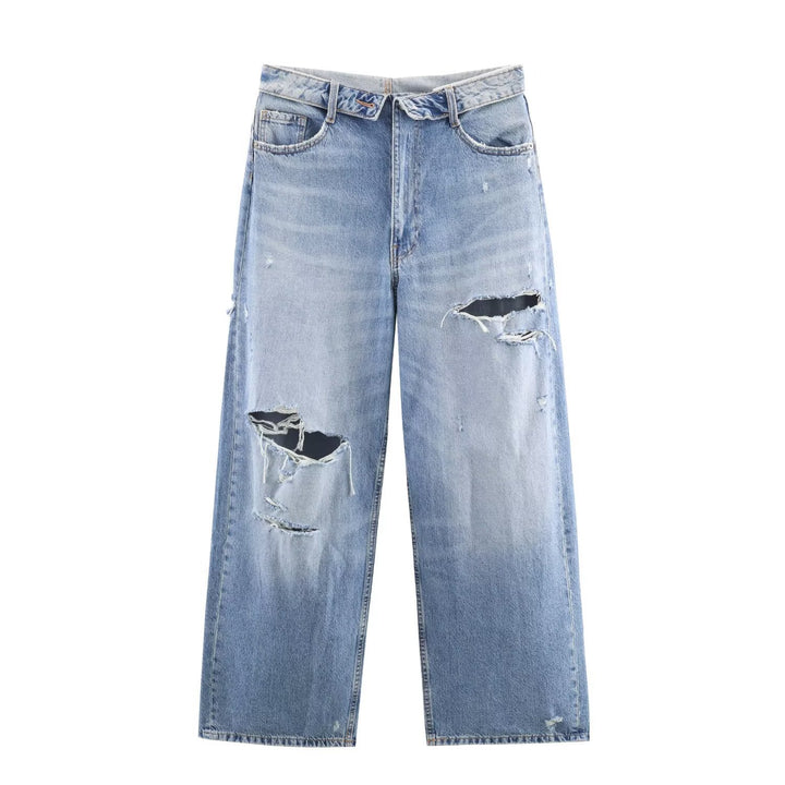 Damern högkvalitativa destroyade jeans i en avslappnad baggy-stil med moderna accenter Mirla-Eva Jonsson
