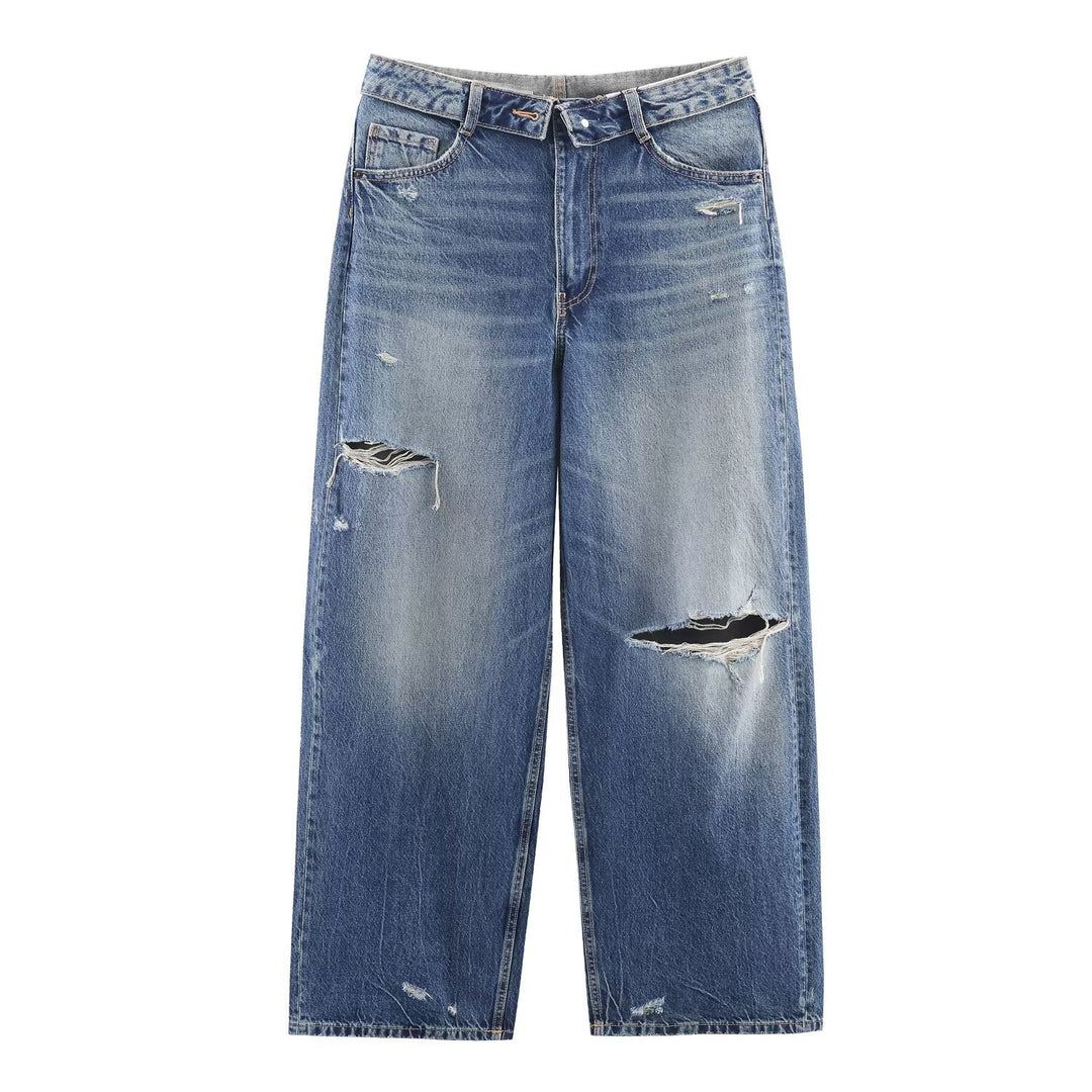 Damern högkvalitativa destroyade jeans i en avslappnad baggy-stil med moderna accenter Mirla-Eva Jonsson