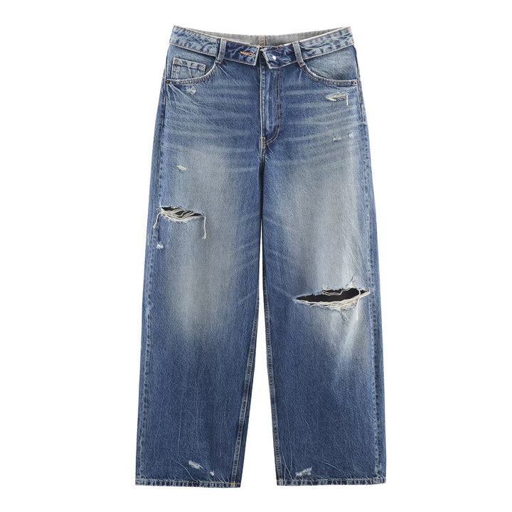 Damern högkvalitativa destroyade jeans i en avslappnad baggy-stil med moderna accenter Mirla-Eva Jonsson
