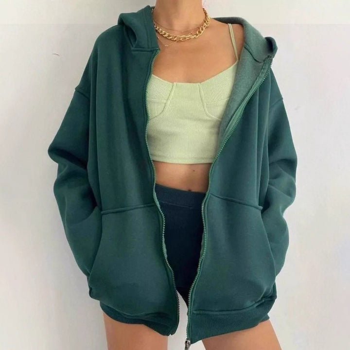 Damern huva jacka med genomgående dragkedja och stora fickor Eva Jonsson-Eva Jonsson